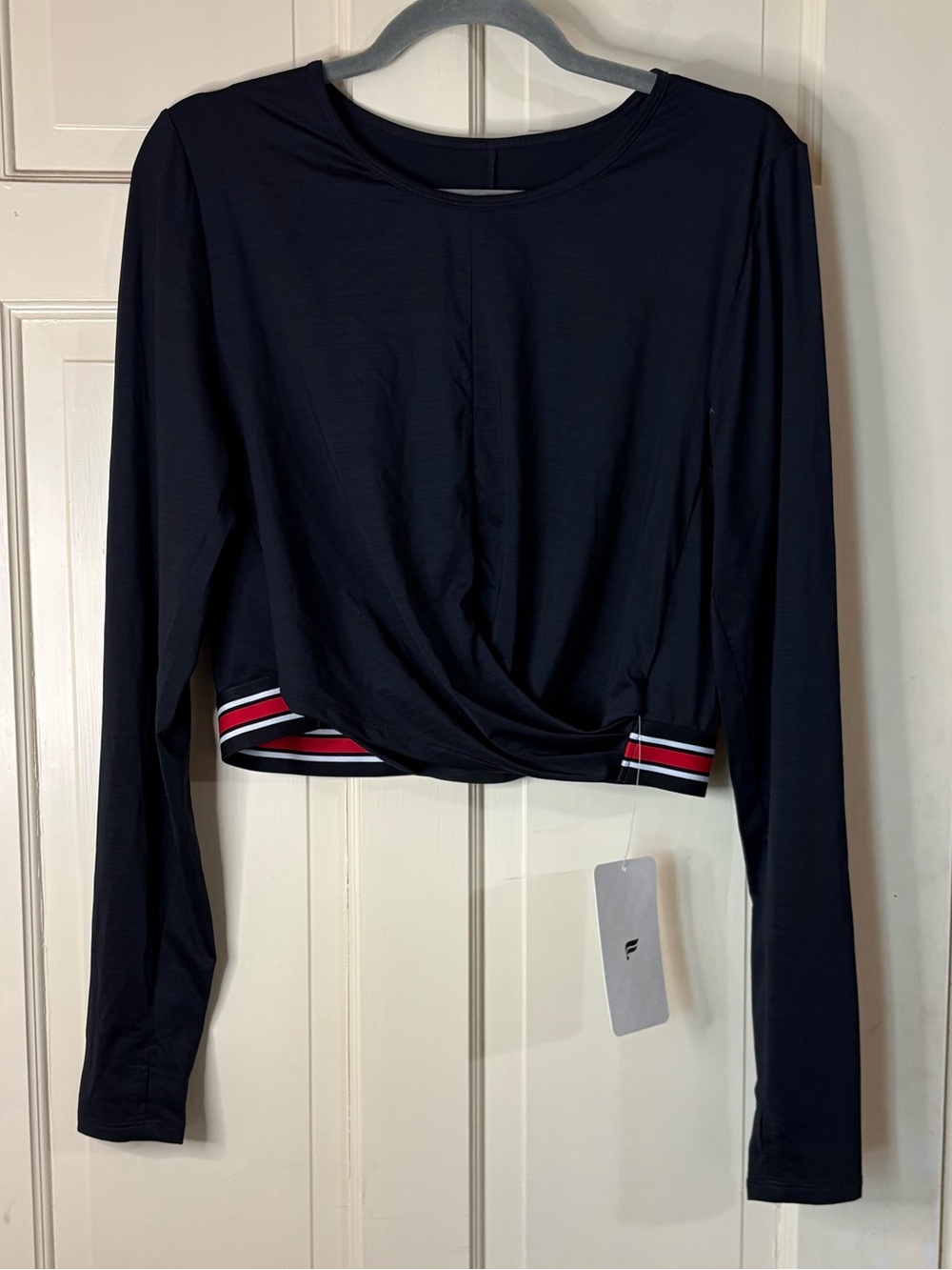 Fabletics Black Long Sleeve Cropped Twist Front Top with Red & White Stripe Hem
